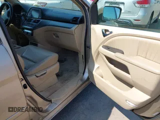 2005 Honda Odyssey EX-L with VIN 5FNRL38755B107829, listed as a IAAI auction lot 42422225 with 227,008 mi miles and . Bid and sale history available at DreamBid. Image 5.