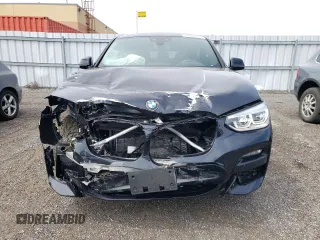 2021 BMW X4 xDrive30i with VIN 5UX2V1C07M9G61961, listed as a Copart auction lot 49663833 with 33,465 mi miles. Bid and sale history available at carsss.com. Image 5.