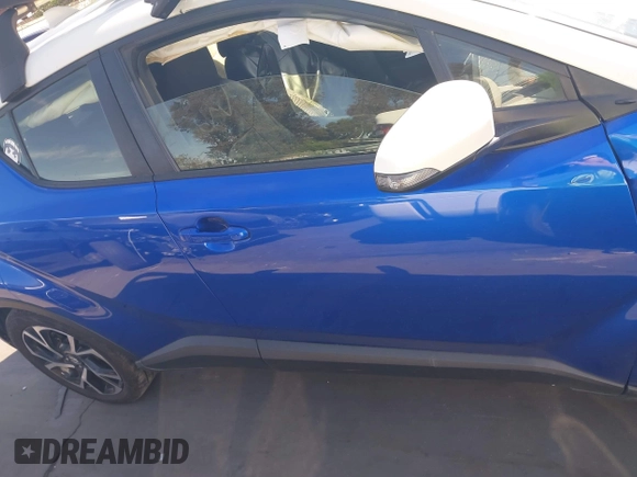 2019 Toyota C-HR XLE with VIN JTNKHMBX5K1043079, listed as a IAAI auction lot 41813367 with 77,879 mi miles and . Bid and sale history available at DreamBid. Image 14.