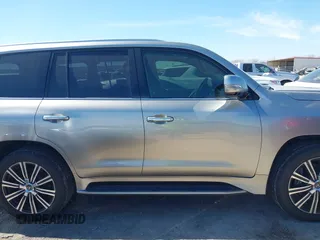 2018 Lexus LX 570 z VIN JTJHY7AX7J4255445, wystawiony jako IAAI lot #41631248 z przebiegiem 86 179 mil mil oraz . Historia ofert i sprzedaży dostępna na DreamBid. Obrazek 13.