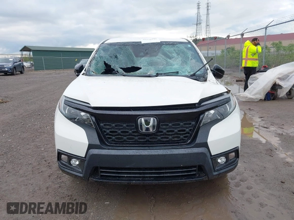 2019 Honda Passport Sport with VIN 5FNYF8H28KB010303, listed as a IAAI auction lot 42178541 with 37,593 mi miles and . Bid and sale history available at DreamBid. Image 12.