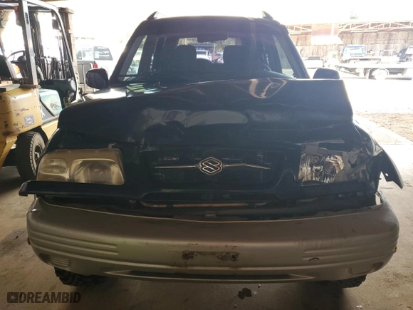 2000 Suzuki Grand Vitara JLX with VIN JS3TD62VXY4110167, listed as a Copart auction lot 77887674 with 126,214 mi miles and Salvage Title. Bid and sale history available at carsss.com. Image 5.