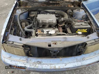 1991 Plymouth Acclaim z VIN 1P3XA4633MF523214, wystawiony jako Copart lot #55908665 z przebiegiem 90 332 mil mil oraz Tytuł czysty. Historia ofert i sprzedaży dostępna na DreamBid. Obrazek 11.