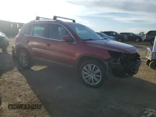 2011 Volkswagen Tiguan SEL with VIN WVGBV7AX4BW001386, listed as a Copart auction lot 44495945 with 149,806 mi miles and Salvage Title. Bid and sale history available at DreamBid. Image 4.