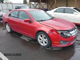 2012 Ford Fusion SE z VIN 3FAHP0HA7CR402846, wystawiony jako IAAI lot #42001460 z przebiegiem 153 410 mil mil oraz . Historia ofert i sprzedaży dostępna na DreamBid. Obrazek 1.