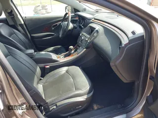 2012 Buick LaCrosse Premium 2 z VIN 1G4GF5E30CF119175, wystawiony jako IAAI lot #42132708 z przebiegiem 145 535 mil mil oraz . Historia ofert i sprzedaży dostępna na DreamBid. Obrazek 5.