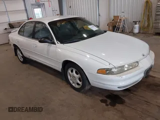 1999 Oldsmobile Intrigue GX z VIN 1G3WH52K6XF328030, wystawiony jako IAAI lot #42334804 z przebiegiem Nie podano mil oraz . Historia ofert i sprzedaży dostępna na DreamBid. Obrazek 1.