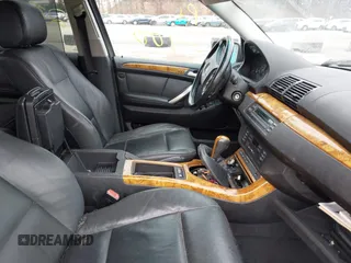 2001 BMW X5 3.0i with VIN WBAFA53571LM67411, listed as a IAAI auction lot 41727600 with 999,999 mi miles. Bid and sale history available at carsss.com. Image 5.