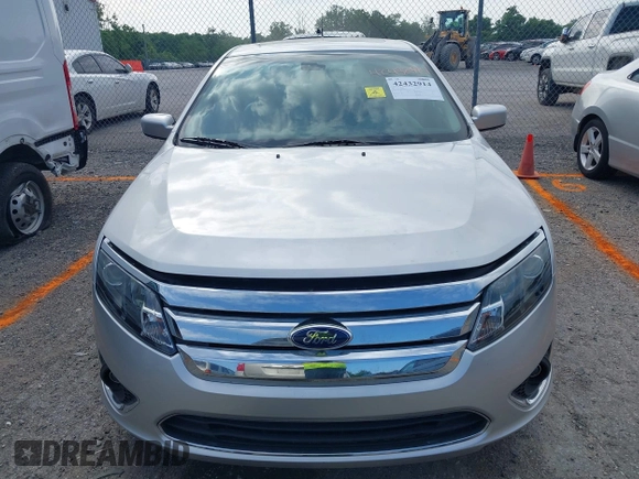 2011 Ford Fusion Hybrid z VIN 3FADP0L34BR208880, wystawiony jako IAAI lot #42432914 z przebiegiem 75 621 mil mil oraz . Historia ofert i sprzedaży dostępna na DreamBid. Obrazek 6.