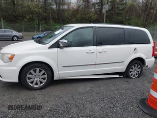 2012 Chrysler Town & Country Touring L with VIN 2C4RC1CG6CR137841, listed as a IAAI auction lot 41951936 with 264,211 mi miles and . Bid and sale history available at carsss.com. Image 14.