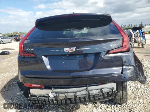 2023 Cadillac XT4 FWD Luxury with VIN 1GYAZAR4XPF104311, listed as a Copart auction lot 46891635 with 28,972 mi miles and Non repairable. Bid and sale history available at DreamBid. Image 6.