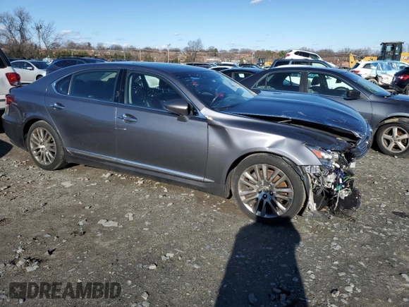 2015 Lexus LS 460 L with VIN JTHGL1EFXF5055493, listed as a Copart auction lot 86601044 with 130,849 mi miles and Salvage title. Bid and sale history available at DreamBid. Image 4.