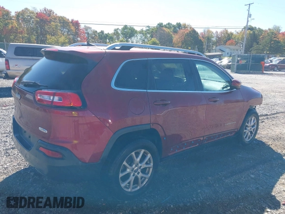 2016 Jeep Cherokee Latitude with VIN 1C4PJMCB2GW153972, listed as a IAAI auction lot 40579489 with 130,176 mi miles. Bid and sale history available at carsss.com. Image 4.