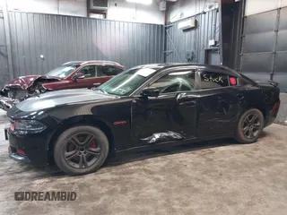 2020 Dodge Charger SXT z VIN 2C3CDXBG2LH117653, wystawiony jako IAAI lot #41753759 z przebiegiem 87 690 mil mil oraz . Historia ofert i sprzedaży dostępna na DreamBid. Obrazek 6.