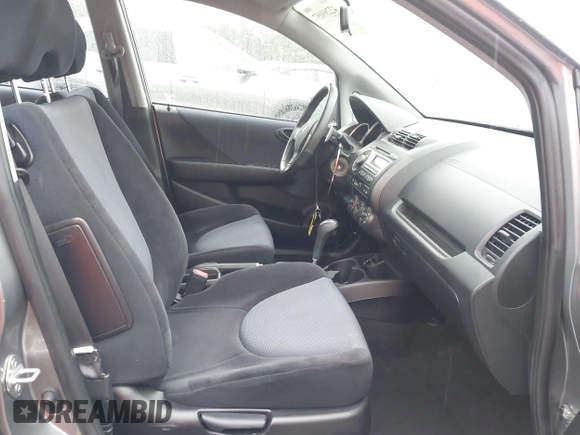 2007 Honda Fit Sport z VIN JHMGD38647S049521, wystawiony jako IAAI lot #42289057 z przebiegiem 130 434 mil mil oraz . Historia ofert i sprzedaży dostępna na DreamBid. Obrazek 5.