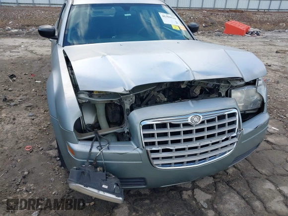 2005 Chrysler 300 with VIN 2C3JA43R05H137403, listed as a IAAI auction lot 41399519 with 135,044 mi miles. Bid and sale history available at carsss.com. Image 6.