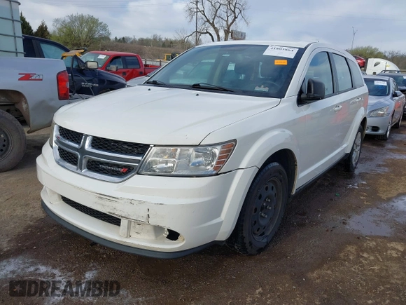 2014 Dodge Journey American Value with VIN 3C4PDCAB1ET209973, listed as a IAAI auction lot 41803864 with 168,774 mi miles and . Bid and sale history available at DreamBid. Image 18.