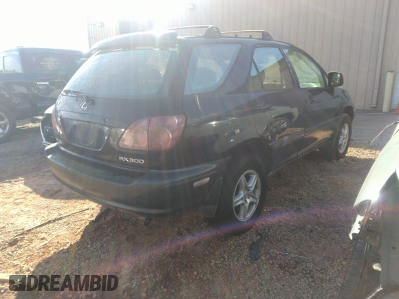 1999 Lexus RX 300 Luxury SUV with VIN JT6HF10U7X0038014, listed as a IAAI auction lot 41244208 with 183,823 mi miles. Bid and sale history available at carsss.com. Image 4.