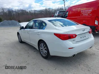 2015 Infiniti Q50 Premium z VIN JN1BV7ARXFM399617, wystawiony jako IAAI lot #41884672 z przebiegiem 116 320 mil mil oraz . Historia ofert i sprzedaży dostępna na DreamBid. Obrazek 3.