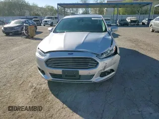 2013 Ford Fusion Titanium Hybrid with VIN 3FA6P0RU5DR321121, listed as a Copart auction lot 77019974 with 160,361 mi miles and Salvage Title. Bid and sale history available at DreamBid. Image 13.