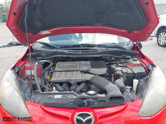 2012 Mazda Mazda2 Sport with VIN JM1DE1KZXC0151940, listed as a IAAI auction lot 41949336 with 92,923 mi miles. Bid and sale history available at carsss.com. Image 10.