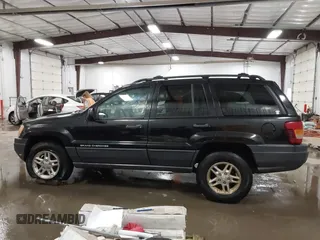 2004 Jeep Grand Cherokee Laredo with VIN 1J4GW48N84C367215, listed as a IAAI auction lot 41352098 with 165,485 mi miles and . Bid and sale history available at DreamBid. Image 14.