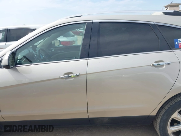 2013 Cadillac SRX Performance Collection with VIN 3GYFNDE34DS634099, listed as a IAAI auction lot 41931125 with 134,318 mi miles and . Bid and sale history available at carsss.com. Image 14.