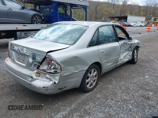 2002 Toyota Avalon XL with VIN 4T1BF28B12U234616, listed as a IAAI auction lot 41954288 with 148,418 mi miles. Bid and sale history available at carsss.com. Image 4.
