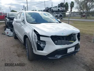 2024 Cadillac XT4 FWD Sport with VIN 1GYFZER48RF180481, listed as a IAAI auction lot 41093587 with 3,982 mi miles and . Bid and sale history available at DreamBid. Image 1.