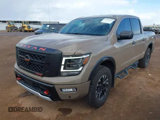 2021 Nissan Titan Pro-4X with VIN 1N6AA1ED9MN519749, listed as a IAAI auction lot 41948962 with 65,807 mi miles and . Bid and sale history available at DreamBid. Image 2.
