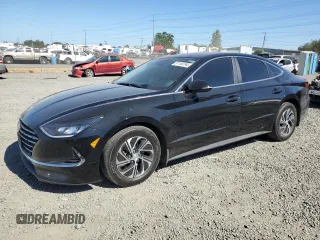 2022 Hyundai Sonata Hybrid Blue with VIN KMHL24JJ9NA052455, listed as a Copart auction lot 61164194 with 31,272 mi miles and Salvage Title. Bid and sale history available at carsss.com. Image 1.