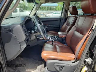 2008 Jeep Commander Limited z VIN 1J8HG58N58C151107, wystawiony jako Copart lot #64898595 z przebiegiem 268 857 mil mil oraz Czysty tytuł • Clean title. Historia ofert i sprzedaży dostępna na DreamBid. Obrazek 7.