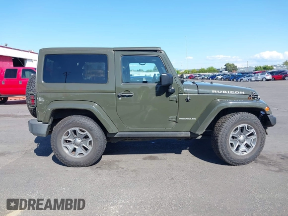 2015 Jeep Wrangler Rubicon Hard Rock with VIN 1C4BJWCGXFL771669, listed as a IAAI auction lot 42057423 with 36,996 mi miles and . Bid and sale history available at DreamBid. Image 14.