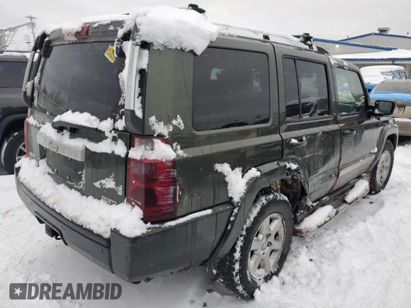 2007 Jeep Commander Overland with VIN 1J8HG68247C555994, listed as a Copart auction lot 86903914 with 219,294 mi miles and Salvage title. Bid and sale history available at DreamBid. Image 3.