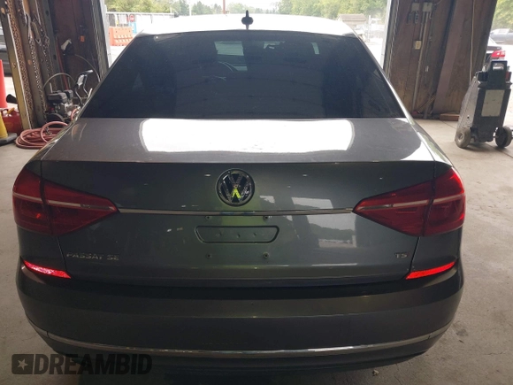 2016 Volkswagen Passat 1.8T SE with VIN 1VWBT7A35GC011129, listed as a IAAI auction lot 39977788 with 123,007 mi miles. Bid and sale history available at carsss.com. Image 16.