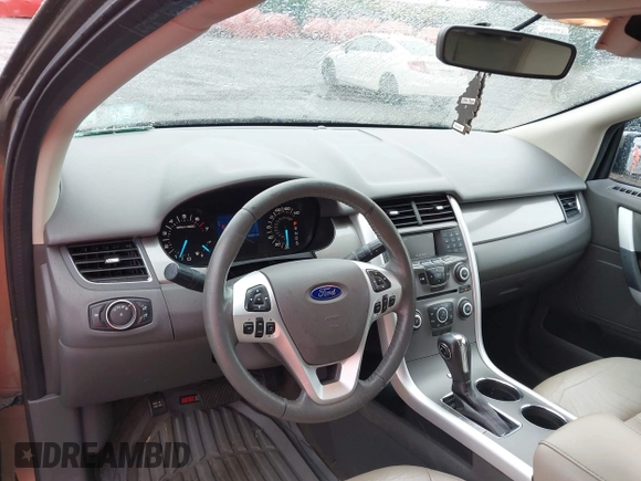 2014 Ford Edge SEL z VIN 2FMDK4JC0EBA36381, wystawiony jako IAAI lot #42236973 z przebiegiem 146 053 mil mil oraz . Historia ofert i sprzedaży dostępna na DreamBid. Obrazek 17.