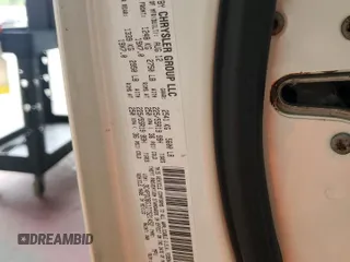 2013 Dodge Journey SXT with VIN 3C4PDDBG1DT521452, listed as a Copart auction lot 62660785 with 177,945 mi miles and Salvage title. Bid and sale history available at DreamBid. Image 13.