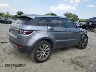 2014 Land Rover Range Rover Evoque Prestige Premium with VIN SALVV2BG5EH950921, listed as a Copart auction lot 57574564 with 151,449 mi miles and Salvage Title. Bid and sale history available at carsss.com. Image 3.