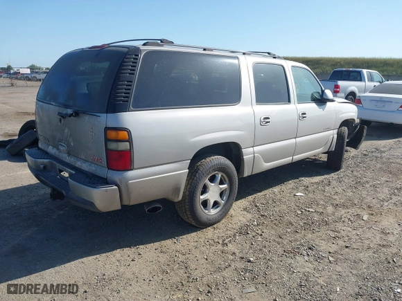 2004 GMC Yukon XL Denali with VIN 1GKFK66U64J214013, listed as a IAAI auction lot 42075928 with 277,194 mi miles. Bid and sale history available at carsss.com. Image 4.