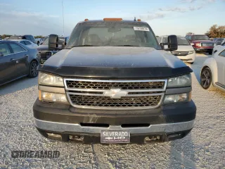 2006 Chevrolet Silverado 3500 DRW LT1 with VIN 1GCJK33DX6F142117, listed as a Copart auction lot 76250014 with 0 mi miles and Salvage Title. Bid and sale history available at carsss.com. Image 5.
