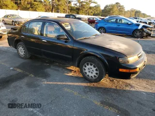 1998 Nissan Maxima GXE с VIN JN1CA21D6WT533634, выставлен на аукционе Copart как лот 83339404 с пробегом 180 356 миль миль и Списание • Salvage title. История ставок и продаж доступна на DreamBid. Изображение 4.