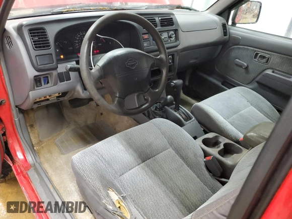 1999 Nissan Frontier XE with VIN 1N6ED26Y5XC308158, listed as a Copart auction lot 84320904 with 316,532 mi miles and Clean title. Bid and sale history available at DreamBid. Image 8.