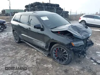 2017 Jeep Grand Cherokee SRT with VIN 1C4RJFDJ7HC641926, listed as a IAAI auction lot 41272215 with 117,667 mi miles. Bid and sale history available at carsss.com. Image 1.