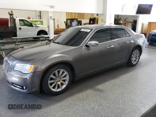 2012 Chrysler 300 Limited with VIN 2C3CCACG6CH249345, listed as a Copart auction lot 65818555 with 106,284 mi miles and Clean title. Bid and sale history available at DreamBid. Image 1.