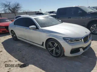 2019 BMW 7 Series 750i with VIN WBA7F0C5XKGM25348, listed as a Copart auction lot 46537485 with 54,365 mi miles and Salvage title. Bid and sale history available at DreamBid. Image 4.