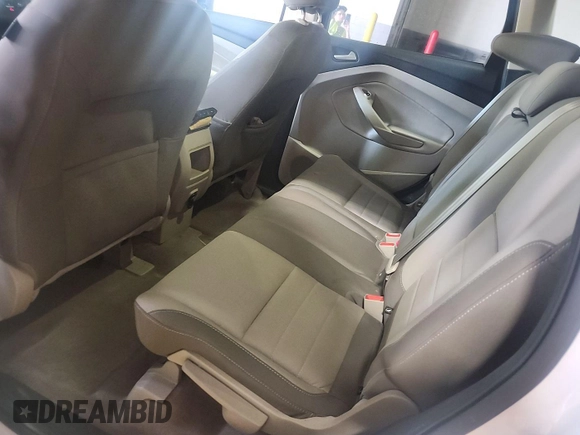 2014 Ford Escape SE z VIN 1FMCU9GX7EUC02600, wystawiony jako IAAI lot #42570755 z przebiegiem 86 871 mil mil oraz . Historia ofert i sprzedaży dostępna na DreamBid. Obrazek 21.