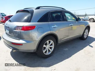 2005 Infiniti FX z VIN JNRAS08W05X216386, wystawiony jako IAAI lot #42346579 z przebiegiem 183 130 mil mil oraz . Historia ofert i sprzedaży dostępna na DreamBid. Obrazek 4.