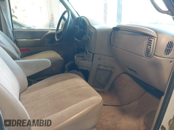 2002 Chevrolet Astro with VIN 1GNDM19X32B146063, listed as a IAAI auction lot 41595819 with 77,364 mi miles. Bid and sale history available at carsss.com. Image 5.