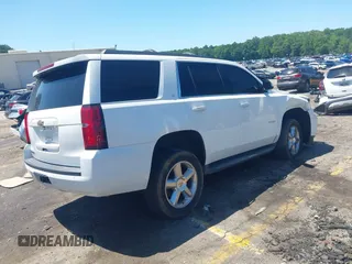 2015 Chevrolet Tahoe LT with VIN 1GNSCBKC4FR648715, listed as a IAAI auction lot 42267719 with Not provided miles and . Bid and sale history available at DreamBid. Image 4.