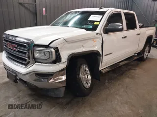 2018 GMC Sierra 1500 SLE z VIN 3GTU2MEC5JG104843, wystawiony jako IAAI lot #42447744 z przebiegiem 136 874 mil mil oraz . Historia ofert i sprzedaży dostępna na DreamBid. Obrazek 6.